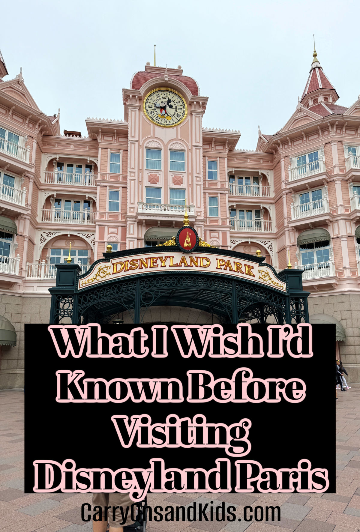 Disneyland Paris entrance with text title of the post overlay.